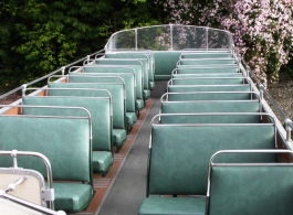 Green open top bus for weddings in Brighton